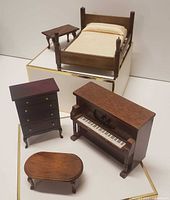 Full group view: bed, side table, coffee table, dresser, piano