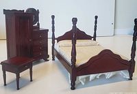 Front angled view of all three miniature furniture pieces
