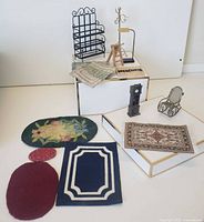 Group shot of all eleven miniature items