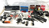 Overview of entire lot showing tools, locks, tubes, pumps, bags and accessories on table