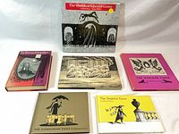 All six books laid out