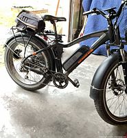 left side view of Rad Power Bikes e-bike with rear bag and battery