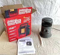 Mr. Heater Portable Buddy boxed unit, Honeywell heater, manuals visible