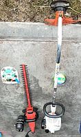 Full lot: Stihl trimmer, hedge trimmer, two line spools, earmuffs, cord