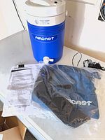 Cooler jug, knee cuff in bag, manual, AC adapter