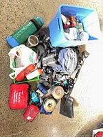 All items laid out including stove, filter, shovel, pots, first aid kits, pad, tote and accessories