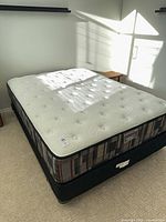 Overall view of mattress set on frame