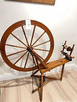 Full view of spinning wheel showing overall structure and condition