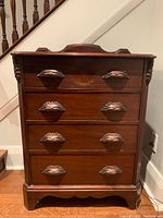 front view of solid wood bureau with four drawers