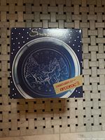 Front of Arcoroc Snow plate box showing design