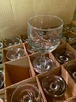 Box with stemmed wine glasses in dividers