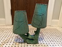 front view of lamp showing ceramic base and two shades