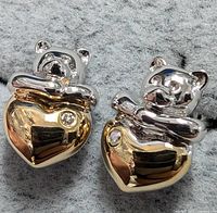 Front view of both teddy bear heart earrings showing silver bears, gold hearts, and diamonds