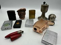 Group shot of all eleven assorted lighters