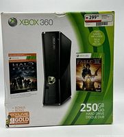 Front of retail box showing console and bundled games