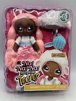 Front view of sealed Na Na Na Surprise Teens Lila Lamb doll in packaging