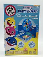 Front of game box showing title, characters, contents icons