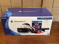 Sealed retail box front showing included items