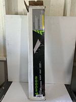 Factory carton standing upright with Woods branding