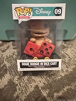 Front view of boxed Funko Pop showing figure and title