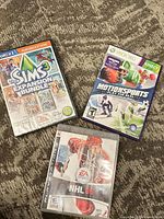 Front view of all three video game cases