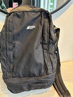 Front view of backpack showing MEC logo and overall condition