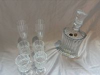 Full set showing decanter, two tall flutes and four stemmed glasses