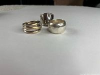 Three sterling silver rings front view
