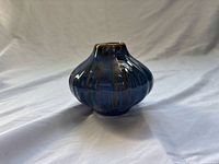 Front view of blue brown drip glaze onion bulb bud vase