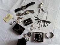 Full lot overhead view showing all jewelry and watches