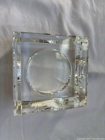 Top view of crystal candle holder showing circular recess