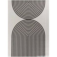 Stock image showing full geometric arch pattern of rug