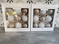 Both unopened ornament sets front view