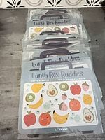 Front view of stacked Lunch Box Buddies sticker packages