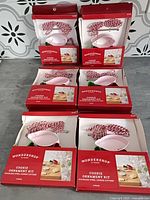 Six boxed Wondershop cookie ornament kits stacked