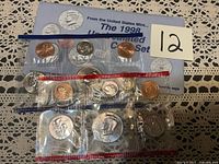 Envelope, lot number slip, and both Denver and Philadelphia sealed packs displayed