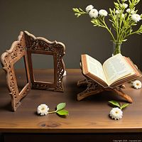 Picture frame and book rest on table, full view of both items
