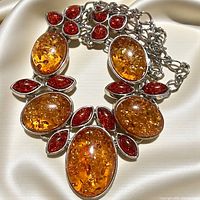 Front view showing cabochon layout and chain