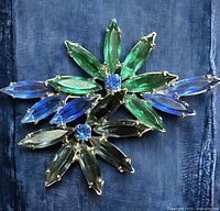 Front view of brooch showing stone colors and arrangement