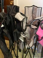 Folded chairs showing frames and carry bag
