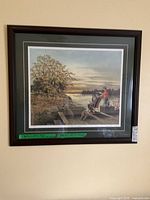 Framed James Lumbers print on wall showing full artwork, mat and frame