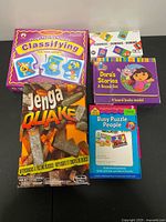 All five boxed items front view