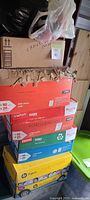 Stack of Staples copy boxes and small cardboard box