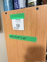 side panel showing light cherry laminate and dimension label