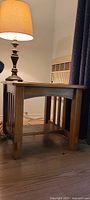 Front view of mission style end table with lamp on top