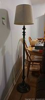 Full view of floor lamp with shade