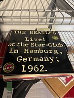 Front cover of Live! At the Star-Club in Hamburg Germany 1962 double LP atop record stack