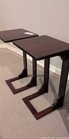 Pair of wooden sofa side tables full view