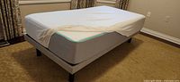 Twin Bloom memory foam mattress on upholstered platform frame