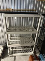 Front view of plastic shelving unit
